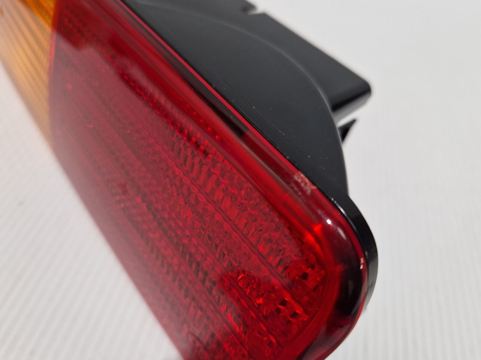 thumbnail image 2 of Allmakes Rear Left Indicator & Fog Bumper Lamp For Land Rover Discovery 2 - XFB101490 2 of 5